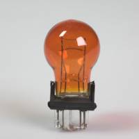 Lampada zoccolo plastica tipo plastic wedge 12 Volt 27/7 Watt attacco W2,5x16q vetro ambra